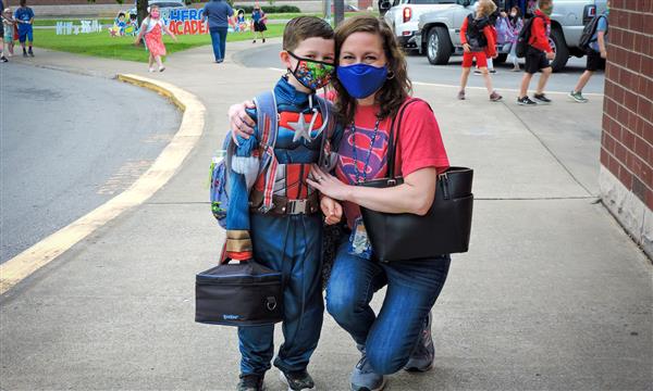 Student and parent pose for photo
